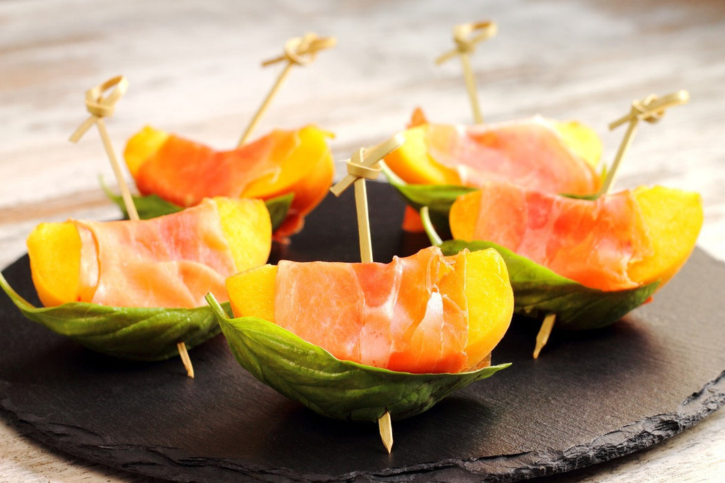 Pincho de bambú Noshi con extremo en punta y decoración en bucle 105mm - 100Uds