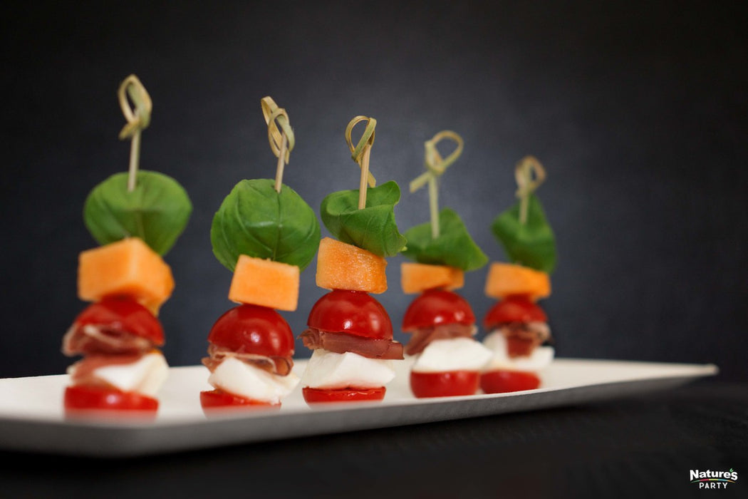 Pincho de bambú Noshi con extremo en punta y decoración en bucle 105mm - 100Uds